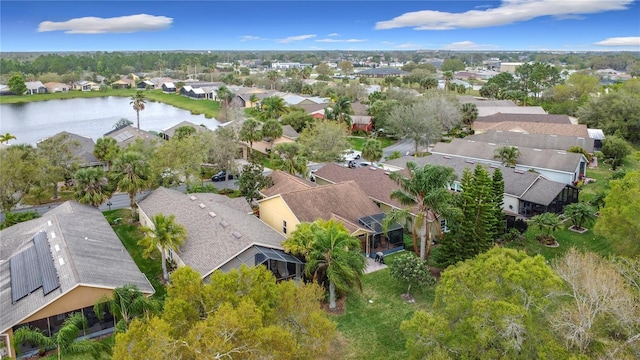 bird's eye view with a water view and a residential view