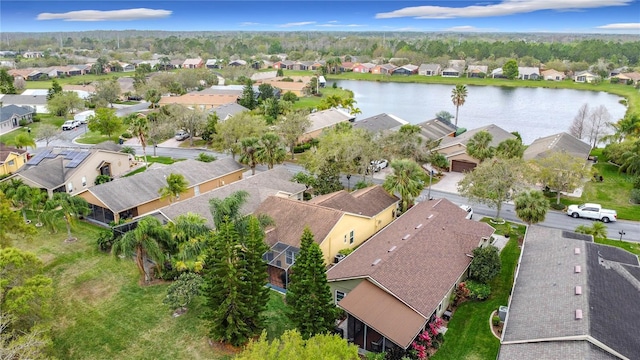 bird's eye view with a water view and a residential view