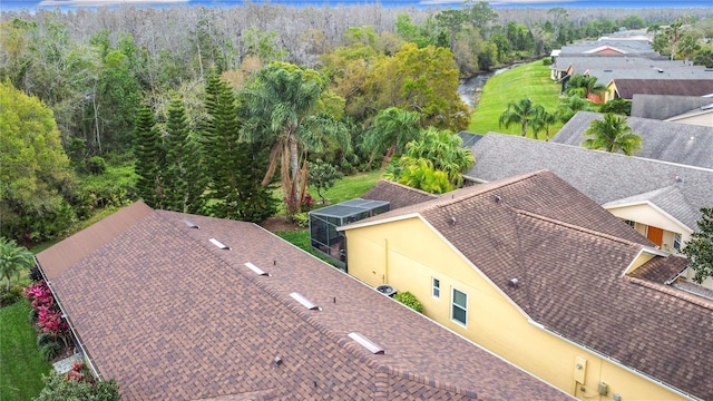 bird's eye view with a view of trees