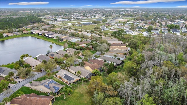 aerial view featuring a residential view and a water view