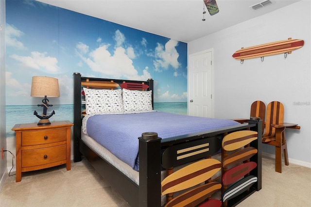 bedroom featuring visible vents, baseboards, and carpet