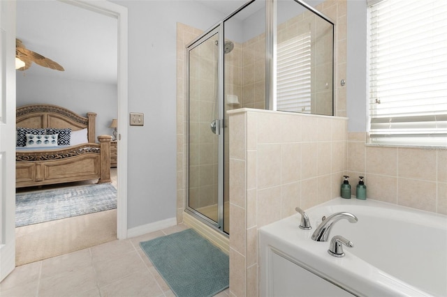 ensuite bathroom with tile patterned floors, a garden tub, ensuite bath, a shower stall, and ceiling fan