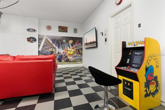 playroom with tile patterned floors and baseboards