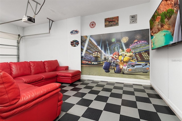 rec room featuring tile patterned floors and a garage