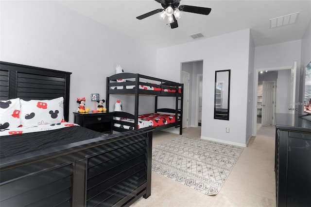 bedroom with visible vents, carpet floors, and baseboards