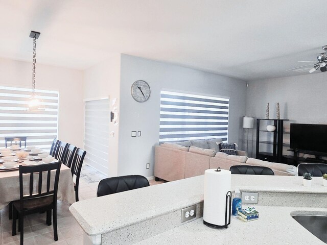 2663 Sand Hill Point Cir, Davenport, FL 33837 - living area with a ceiling fan