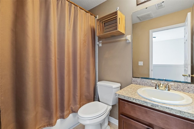 bathroom with visible vents, vanity, and toilet