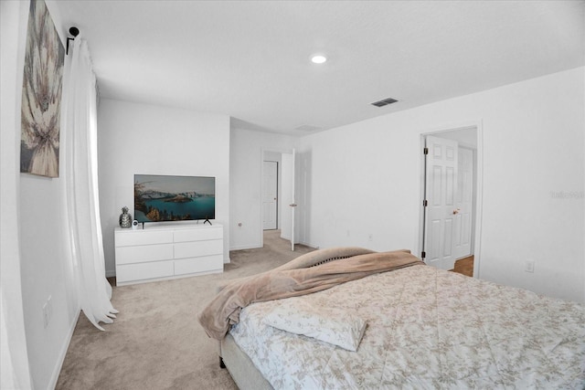 bedroom with carpet floors and visible vents