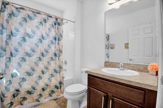 bathroom with shower / bathtub combination with curtain, toilet, and vanity