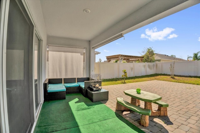 view of patio featuring a fenced backyard and an outdoor hangout area