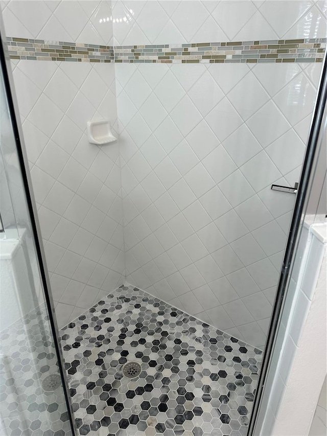 bathroom with a stall shower