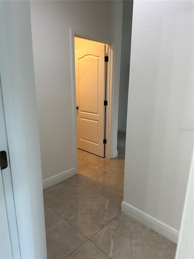 hallway with baseboards