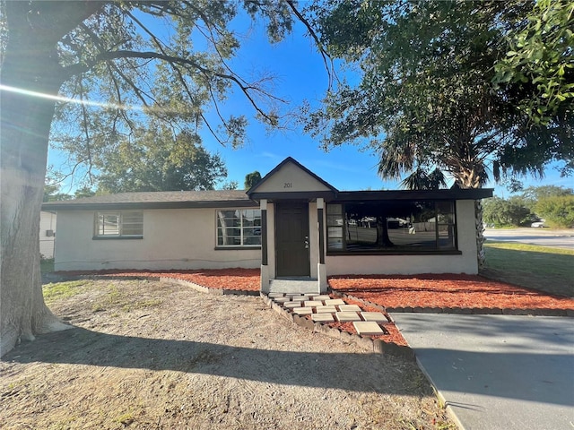 single story home with stucco siding