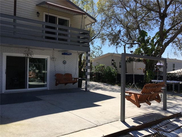 view of patio with a balcony