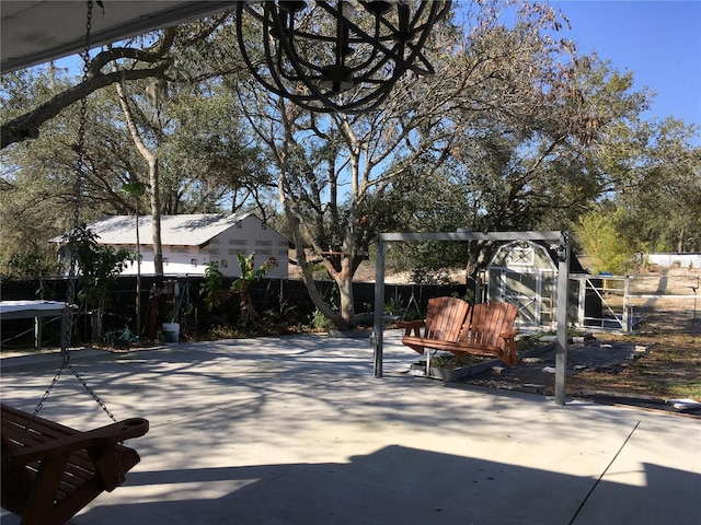 exterior space featuring fence private yard and an outdoor structure