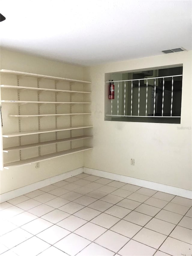 spare room featuring visible vents