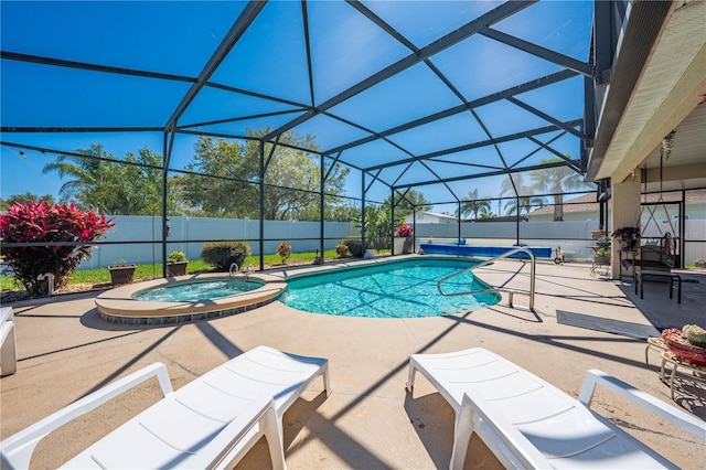 view of swimming pool featuring glass enclosure, a patio, a fenced backyard, and a pool with connected hot tub