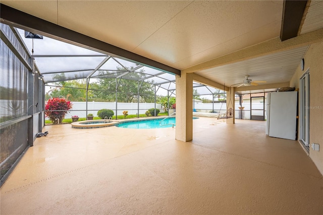 3303 Ann Arbor Ct, Saint Cloud, FL 34772 - view of swimming pool with a patio, a pool with connected hot tub, and glass enclosure