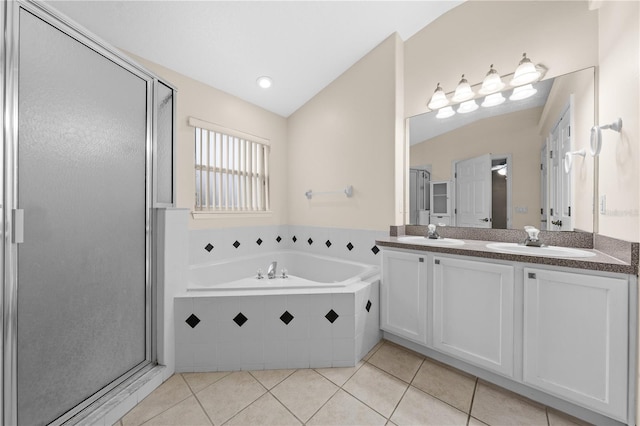 3303 Ann Arbor Ct, Saint Cloud, FL 34772 - full bath featuring tile patterned floors, a bath, a stall shower, and a sink