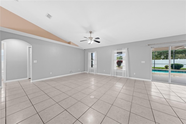 3303 Ann Arbor Ct, Saint Cloud, FL 34772 - unfurnished room with lofted ceiling, plenty of natural light, light tile patterned floors, and a ceiling fan
