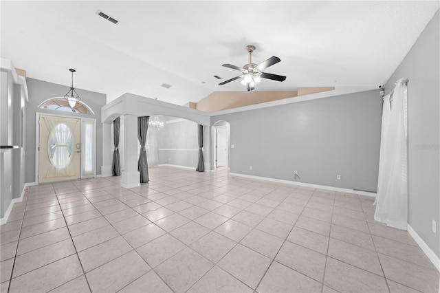 3303 Ann Arbor Ct, Saint Cloud, FL 34772 - interior space featuring vaulted ceiling, arched walkways, light tile patterned floors, and visible vents