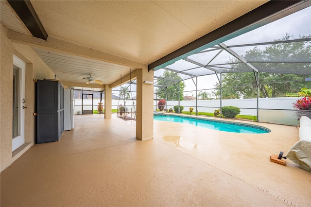 3303 Ann Arbor Ct, Saint Cloud, FL 34772 - view of pool with a patio area, fence, a fenced in pool, and glass enclosure