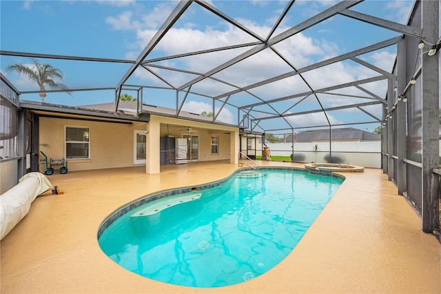 3303 Ann Arbor Ct, Saint Cloud, FL 34772 - view of pool with a pool with connected hot tub, a patio area, a ceiling fan, and glass enclosure