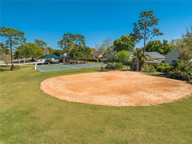 3303 Ann Arbor Ct, Saint Cloud, FL 34772 - view of home's community featuring a lawn and community basketball court