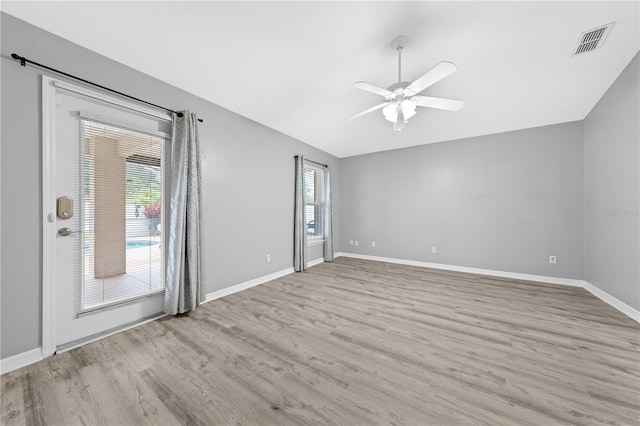 3303 Ann Arbor Ct, Saint Cloud, FL 34772 - empty room with baseboards, a ceiling fan, visible vents, and wood finished floors