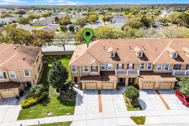 drone / aerial view with a residential view