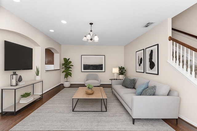 3102 Ashland Ln N Unit 3152, Kissimmee, FL 34741 - living room with dark wood-style flooring, recessed lighting, stairs, and a chandelier