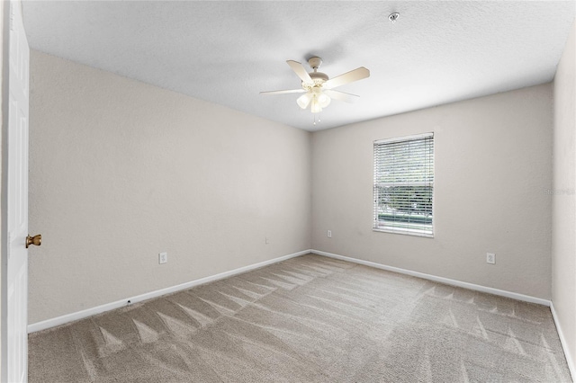 3102 Ashland Ln N Unit 3152, Kissimmee, FL 34741 - carpeted empty room featuring a ceiling fan and baseboards