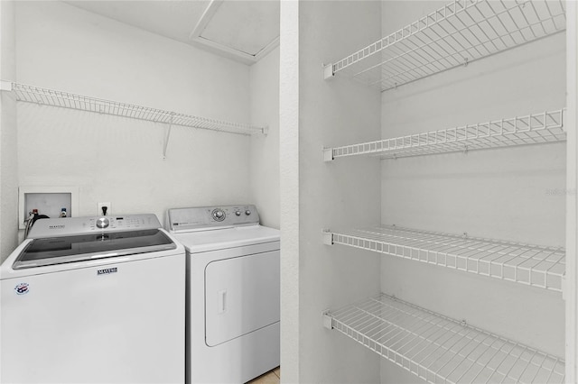 3102 Ashland Ln N Unit 3152, Kissimmee, FL 34741 - laundry area with washing machine and dryer