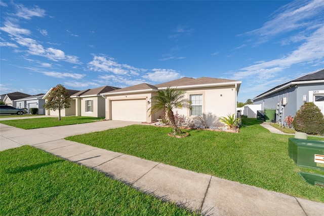 single story home with concrete driveway, a front lawn, an attached garage, and stucco siding