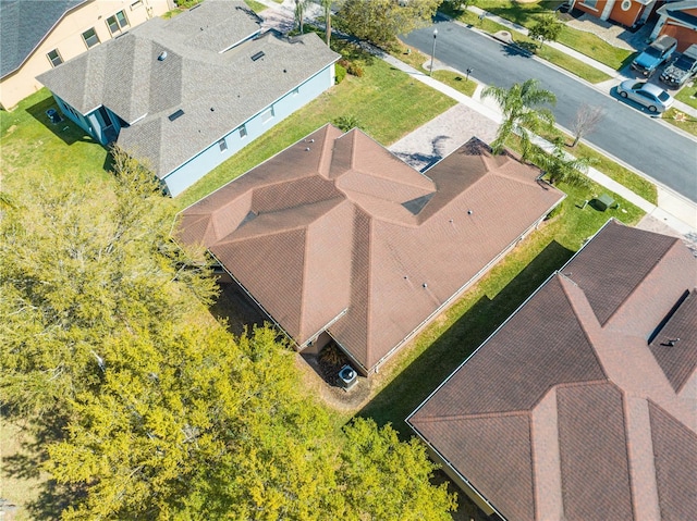 birds eye view of property with a residential view