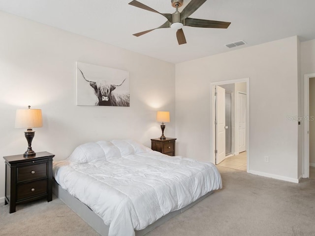 bedroom with ceiling fan, carpet flooring, visible vents, and baseboards