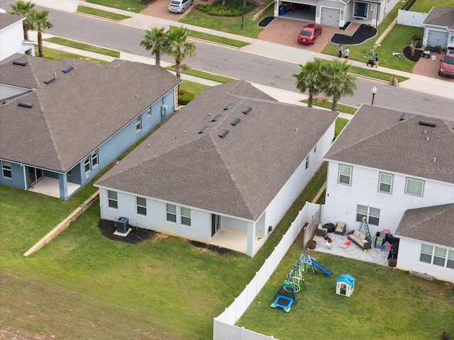 birds eye view of property with a residential view