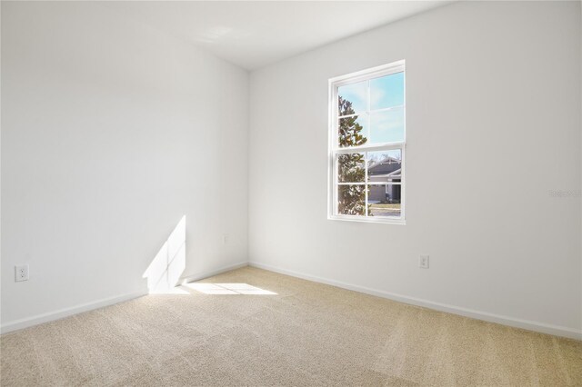 2985 Gavin Sky Dr, Kissimmee, FL 34744 - carpeted spare room with baseboards