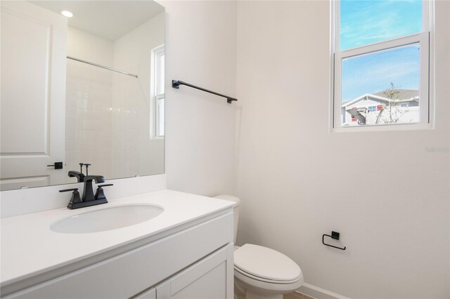 2985 Gavin Sky Dr, Kissimmee, FL 34744 - full bath featuring toilet, baseboards, and vanity