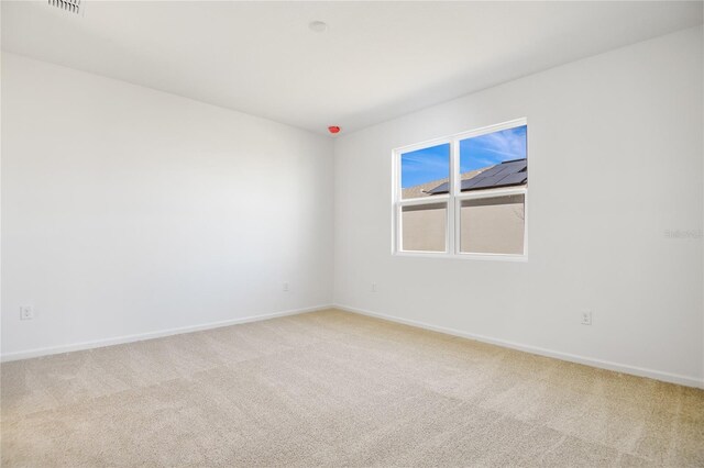 2985 Gavin Sky Dr, Kissimmee, FL 34744 - empty room with light carpet and baseboards