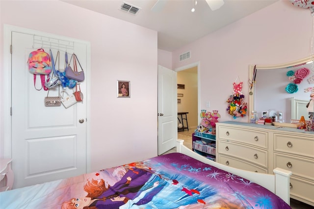 bedroom featuring ceiling fan and visible vents