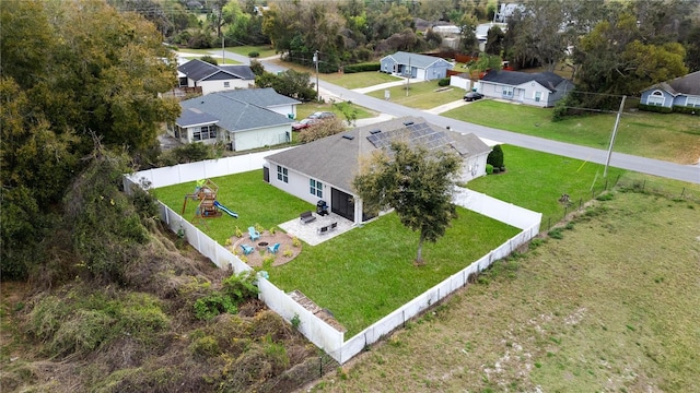 drone / aerial view with a residential view