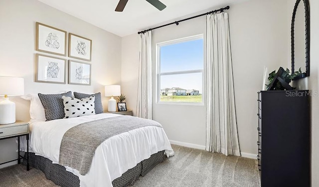 bedroom featuring carpet floors, ceiling fan, and baseboards