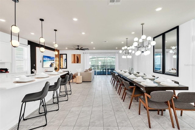 dining space featuring a ceiling fan, a wealth of natural light, visible vents, and recessed lighting