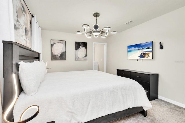 bedroom with light carpet, visible vents, baseboards, and an inviting chandelier