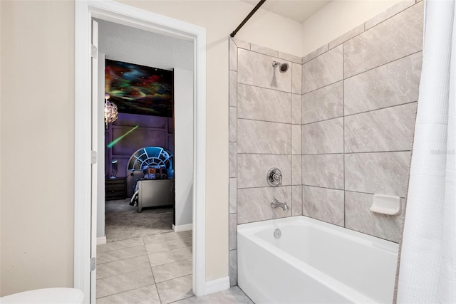 full bathroom featuring toilet, tile patterned flooring, baseboards, and shower / bath combination with curtain