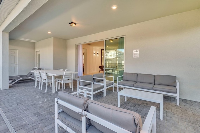 view of patio / terrace with outdoor dining space and outdoor lounge area