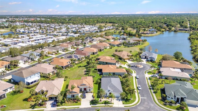 aerial view featuring a water view and a residential view