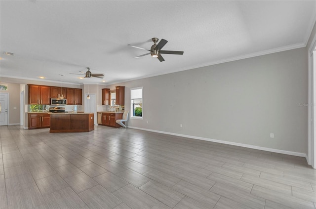 unfurnished living room featuring a ceiling fan, ornamental molding, baseboards, and visible vents