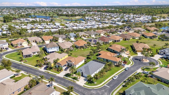 aerial view with a water view and a residential view